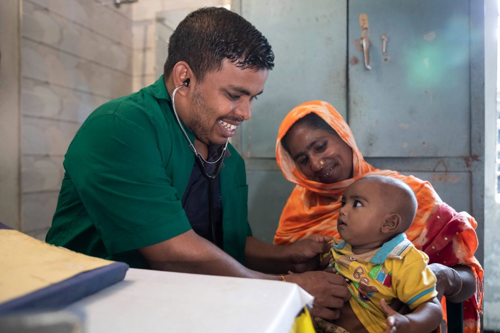 Doctor doing a checkup on a young child